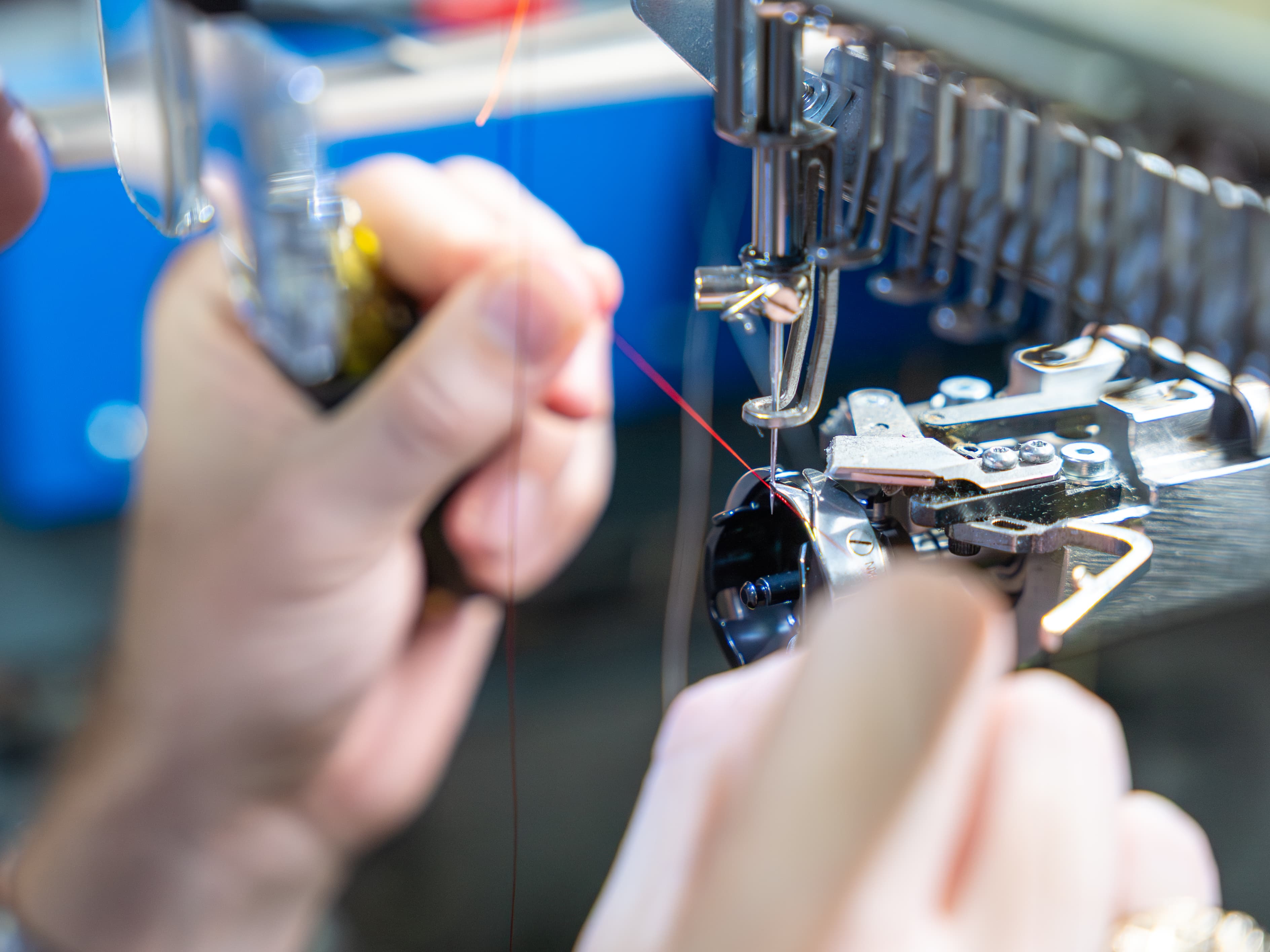 ZSK technician working on embroidery machine